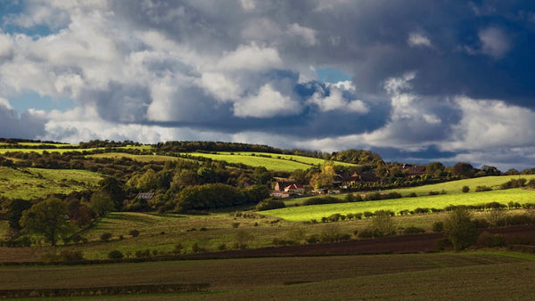 Rolling English countryside with green hills