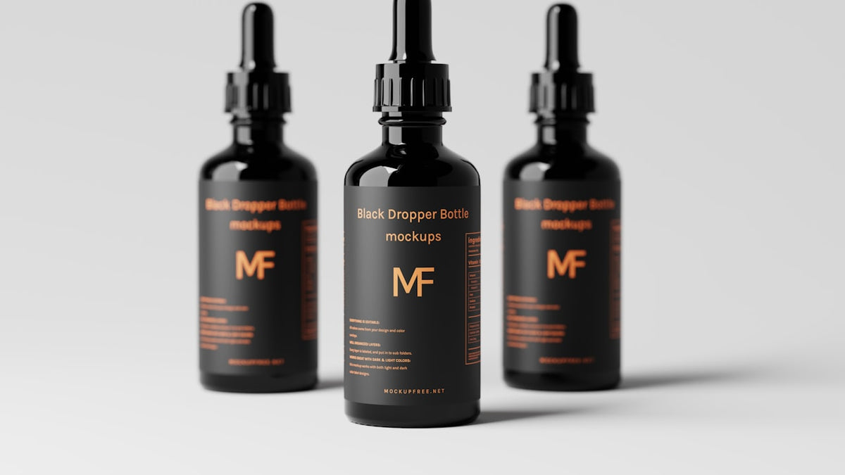 Dark glass dropper bottle on natural surface