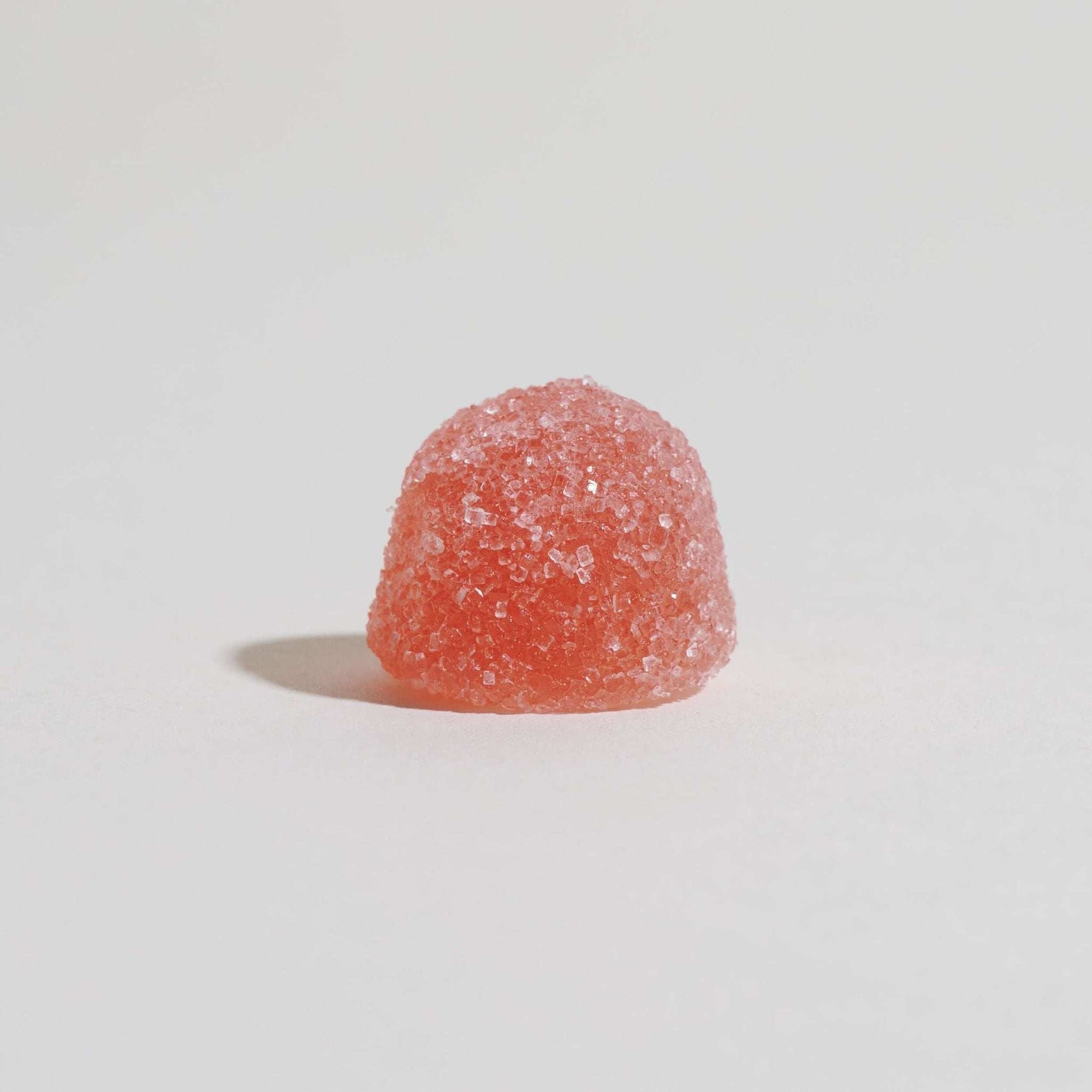 Unspun Broad Spectrum CBD Gummies  - A Single red Gummy 