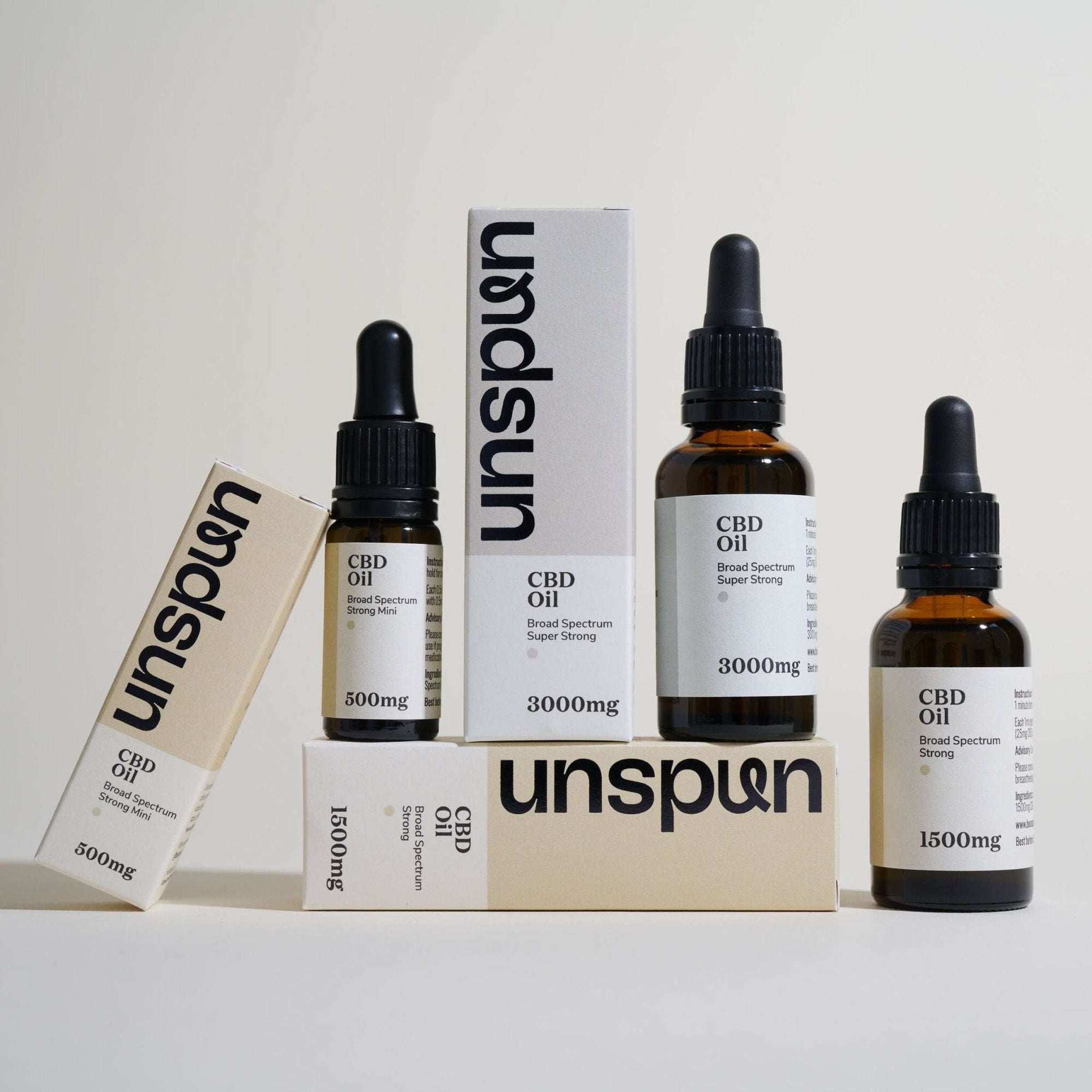 Unspun Broad Spectrum CBD Oil - All Oil products artfully arranged 